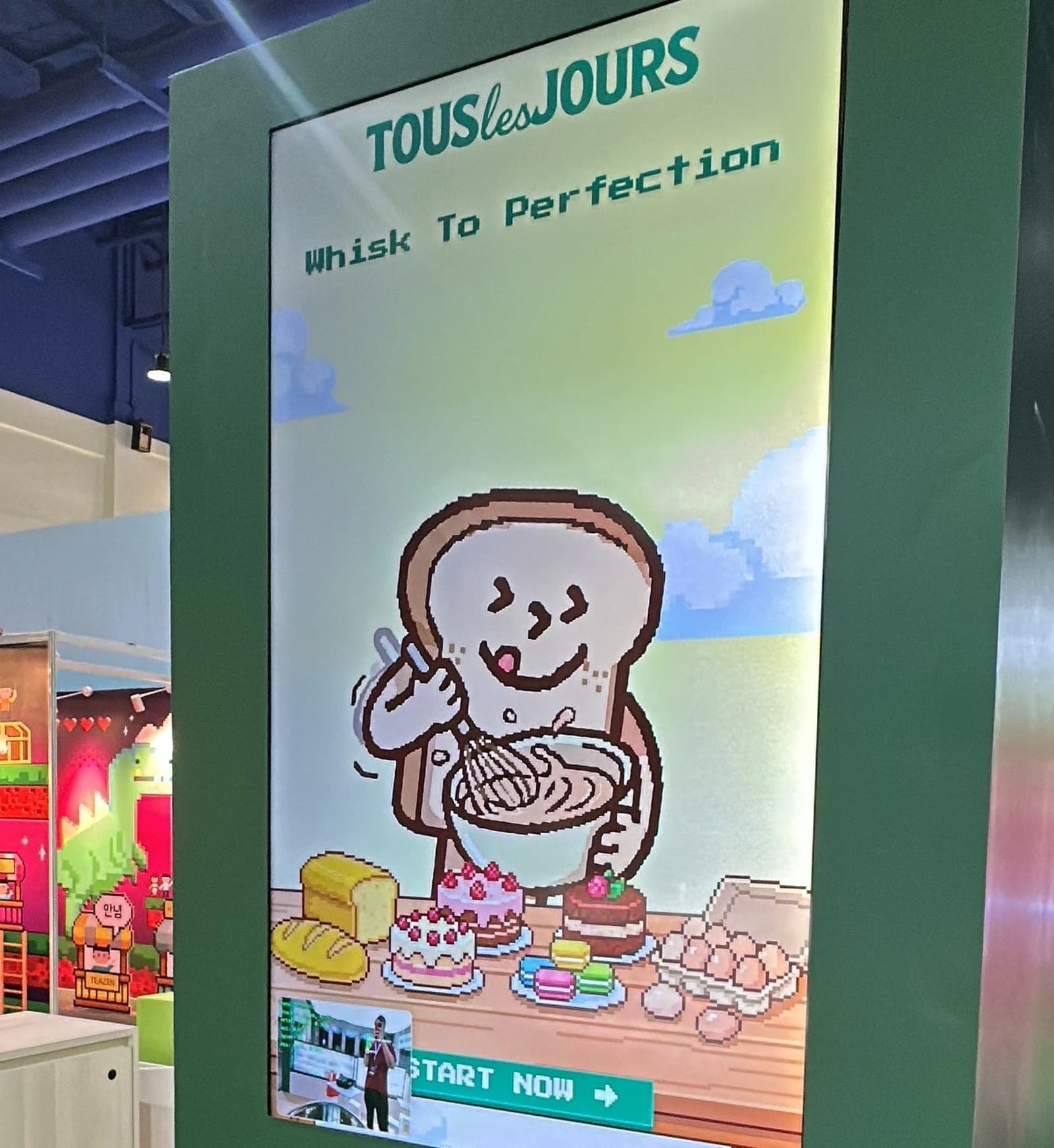 The Tous les Jours Whisk to Perfection interactive game kiosk.