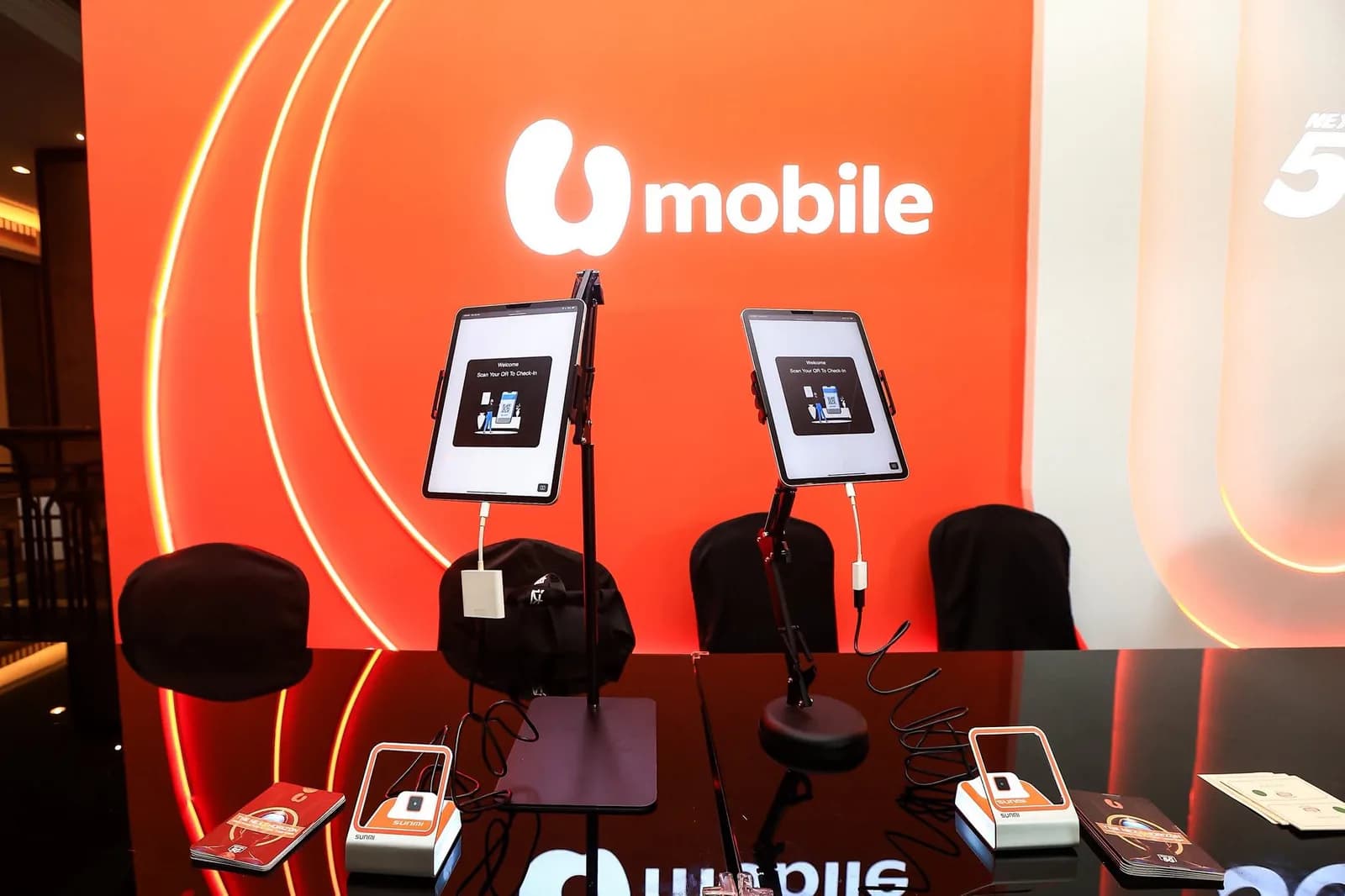 Two tablet stations prepared for QR attendee check-in.