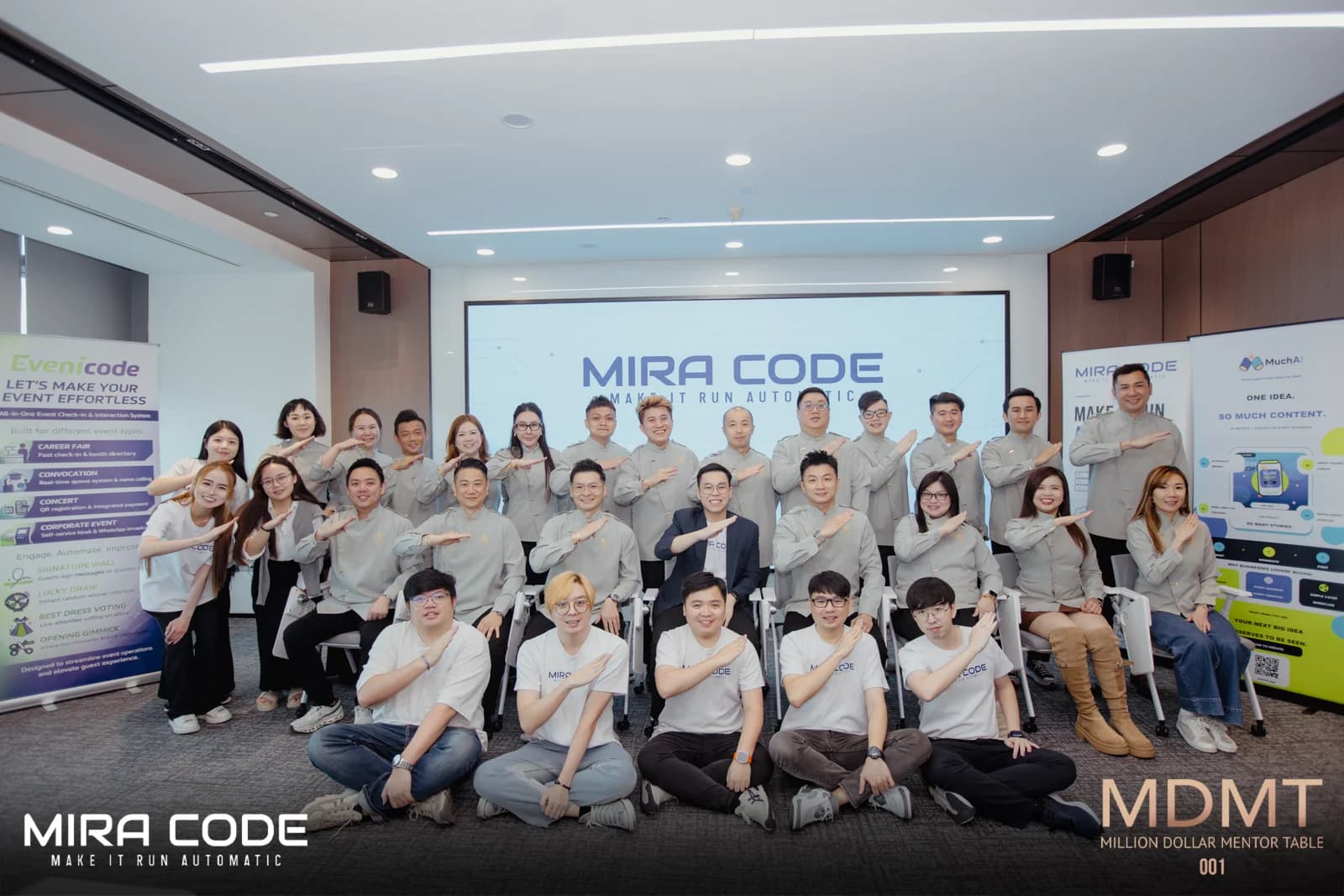 The MIRA CODE team with guests at an AI sharing event.